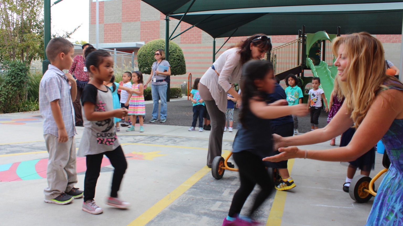 Gina Ann connecting with children at a school visit